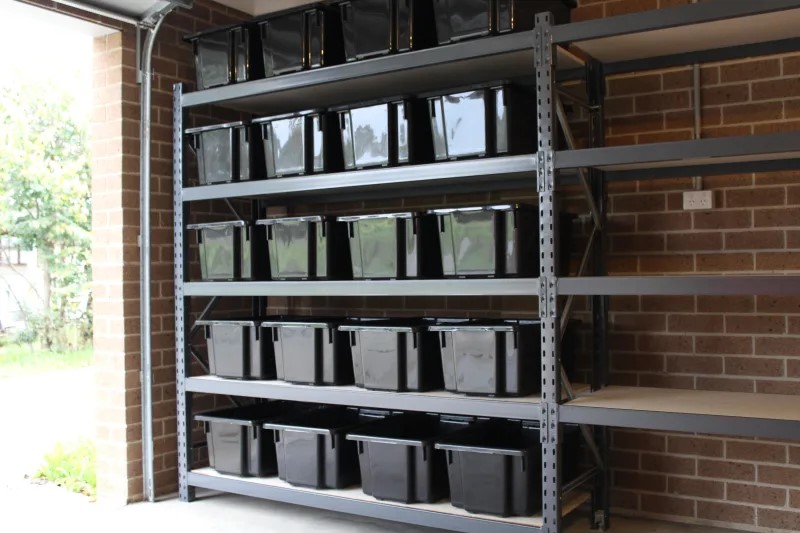 garage with storage boxes organised